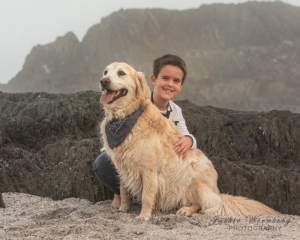 boy-and-dog-on -the-rocks-at-the-beach