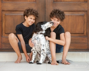 two-boys-and-dog-in-front-door
