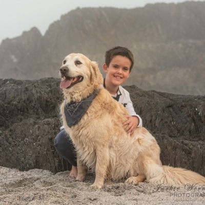 boy-and-dog-on -the-rocks-at-the-beach