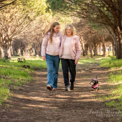 mother-daughter-dachsie-dog-walking-in-park