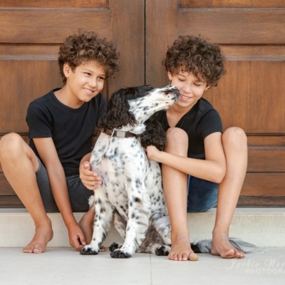 two-boys-and-dog-in-front-door